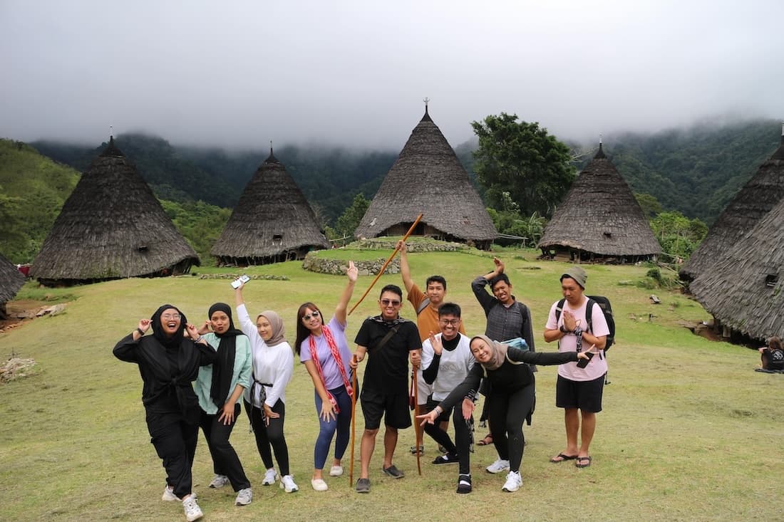 Traditional Wae Rebo village with conical thatched-roof houses, Flores